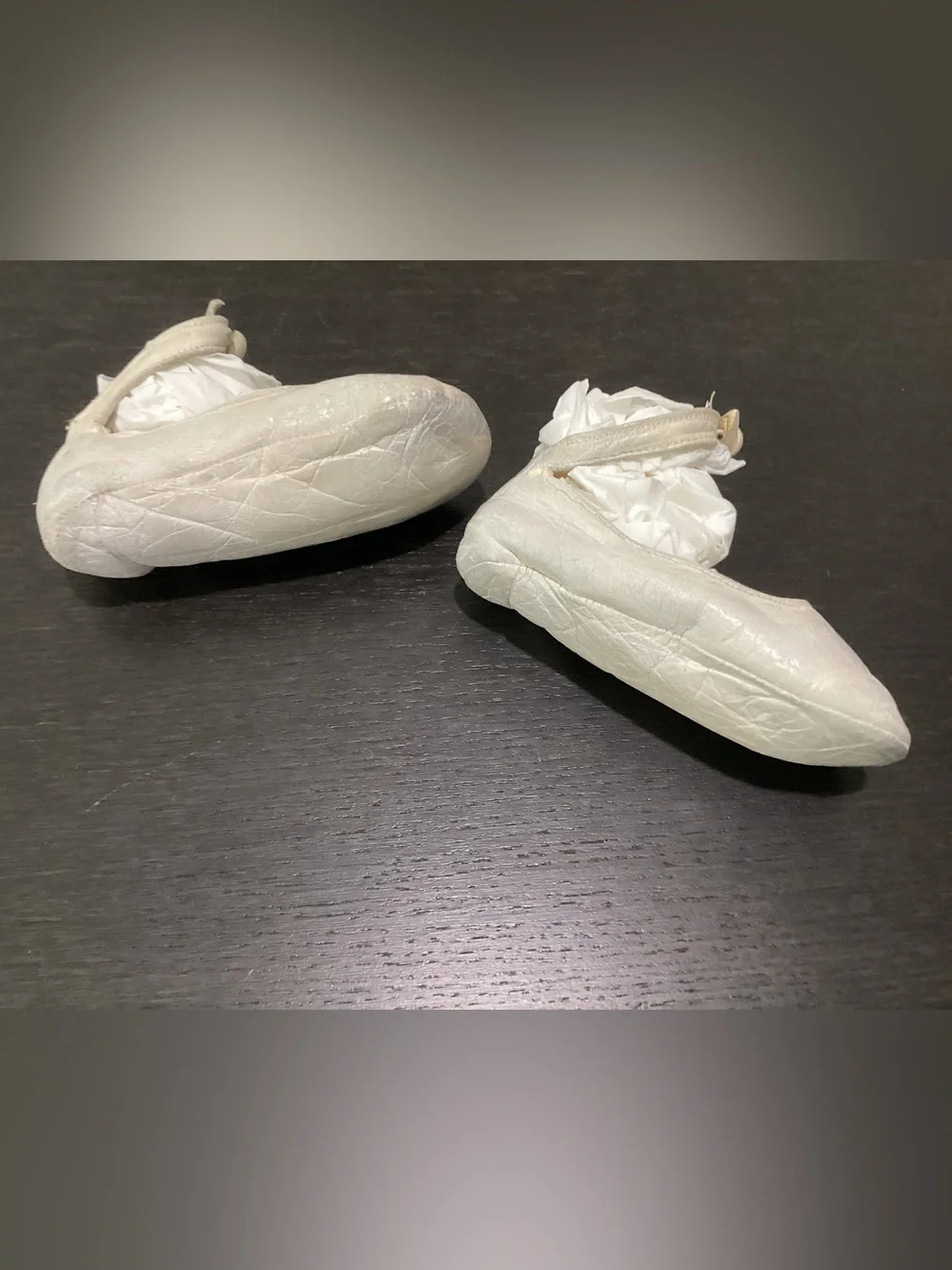 Antique white fine thin leather appropriate for baby shoes.  Likely from the lat